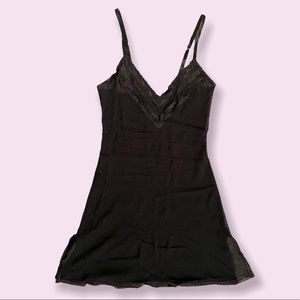 Sheer black negligeé with lace trim